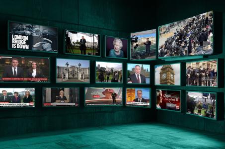 TV screens showing Queen Elizabeth II news